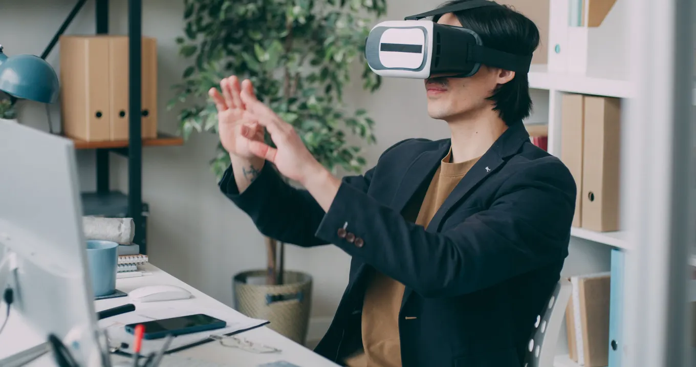 Business professional using a virtual reality headset in an office